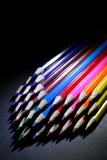 Macro Shot of Sharpened Colorful Pencils Against Black Background. Instruments for writing or drawing, consisting of a thin stick of graphite enclosed in a Stock Photos Macro Shot of Sharpened Colorful Pencils Against Black Background. Instruments for writing or drawing, consisting of a thin stick of graphite enclosed in a Stock Photos