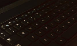 Macro tastiera del computer portatile Fuoco su W, E, S, chiave di D immagini stock libere da diritti Macro tastiera del computer portatile Fuoco su W, E, S, chiave di D immagini stock libere da diritti