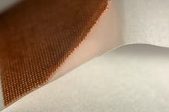 Macro van het deel de beige zelfklevende verband royalty-vrije stock afbeelding Macro van het deel de beige zelfklevende verband royalty-vrije stock afbeelding