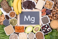 Magnesium food sources, top view on wooden background royalty free stock images Magnesium food sources, top view on wooden background royalty free stock images