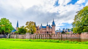 Magnificent Castle De Haar surrounded by a Moat and Beautiful Gardens. A 14th century Castle and restored in the late 19th century royalty free stock images Magnificent Castle De Haar surrounded by a Moat and Beautiful Gardens. A 14th century Castle and restored in the late 19th century royalty free stock images