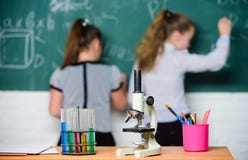 Make studying chemistry interesting. Pupil at chalkboard on chemistry lesson. Educational experiment concept. Girls royalty free stock photography Make studying chemistry interesting. Pupil at chalkboard on chemistry lesson. Educational experiment concept. Girls royalty free stock photography