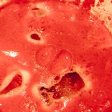 Makro för morotfruktsaft royaltyfri foto Makro för morotfruktsaft royaltyfri foto