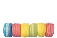Makron bakar ihop i mjuka färger på den pastellfärgade bakgrunden för grönt exponeringsglas royaltyfri bild Makron bakar ihop i mjuka färger på den pastellfärgade bakgrunden för grönt exponeringsglas royaltyfri bild