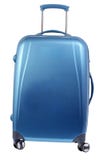 Mala de viagem azul com rodas fotografia de stock Mala de viagem azul com rodas fotografia de stock