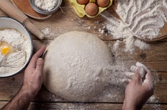 Male baker prepares bread stock photos Male baker prepares bread stock photos