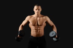 Male bodybuilder posing in studio stock image Male bodybuilder posing in studio stock image