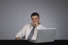 Male Business Person Looking Serious Male Business Person Looking Serious