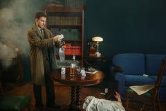 Free Male Detective Puts Murder Weapon In A Bag Royalty Free Stock Photos - 192252318