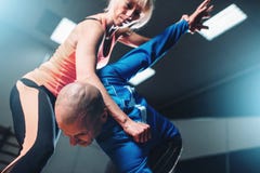 Male and female fighters, self-defense technique
