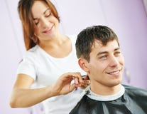 Male hairdresser at work stock photo. Image of mirror 