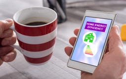 Home energy efficiency concept on a smartphone royalty free stock photos Home energy efficiency concept on a smartphone royalty free stock photos