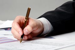 Male Hand Is Writing In The Document Stock Photography