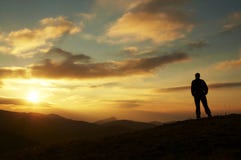 Male Silhouette On Sunrise Stock Images