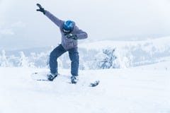 Male snowboarding snowboard jump. go in the mountains on Snow Mountain winter snowboarding stock images Male snowboarding snowboard jump. go in the mountains on Snow Mountain winter snowboarding stock images