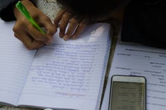 Male students are doing homework with intent. Search the Intern stock photo Male students are doing homework with intent. Search the Intern stock photo