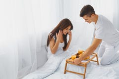 https://thumbs.dreamstime.com/t/male-surprising-female-breakfast-bed-handsome-smiling-his-attractive-happy-romantic-morning-relationships-care-love-61075273.jpg