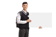 Male teen student holding a blank signboard royalty free stock photos Male teen student holding a blank signboard royalty free stock photos