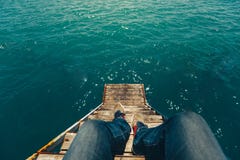 Male Traveler Sitting On Pier With Summer Sea View. Travel Lifestyle Adventure Vacations Concept royalty free stock photos Male Traveler Sitting On Pier With Summer Sea View. Travel Lifestyle Adventure Vacations Concept royalty free stock photos