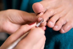 Man And The Procedure Of Pedicure Royalty Free Stock Photos Man And The Procedure Of Pedicure Royalty Free Stock Photos