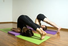 Man And Woman Practicing Yoga - Horizontal Royalty Free Stock Photos Man And Woman Practicing Yoga - Horizontal Royalty Free Stock Photos