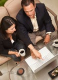 Man And Woman Using Laptop With Coffee Royalty Free Stock Image