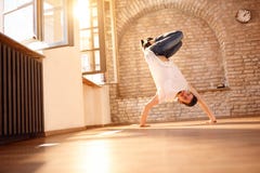 Man break-dancer doing handstand on hands Royalty Free Stock Image Man break-dancer doing handstand on hands Royalty Free Stock Image