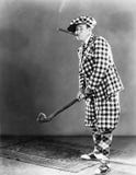 Man in a checkered golf outfit