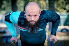 Man doing push ups on parallel bars royalty free stock images Man doing push ups on parallel bars royalty free stock images