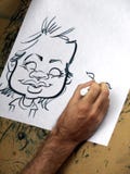 Man Drawing Caricature Royalty Free Stock Photo