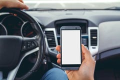 A man driving a car with phone stock photography A man driving a car with phone stock photography