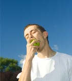Man Eating Apple Royalty Free Stock Photography