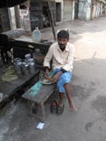 Man eats on the street stock image Man eats on the street stock image