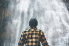 Man enjoying waterfall Travel Lifestyle adventure royalty free stock photos Man enjoying waterfall Travel Lifestyle adventure royalty free stock photos