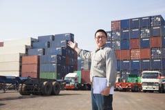 Man in front of container truck Stock Images Man in front of container truck Stock Images