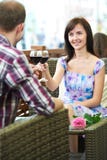 Man and girl with wine at cafe on a date royalty free stock images Man and girl with wine at cafe on a date royalty free stock images