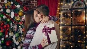Man gives Christmas gift stock video Man gives Christmas gift stock video