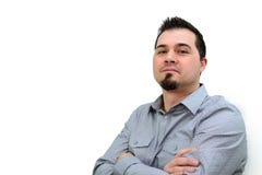 Man in Grey Shirt and Crossed Arms looking Confident Copyspace royalty free stock images Man in Grey Shirt and Crossed Arms looking Confident Copyspace royalty free stock images