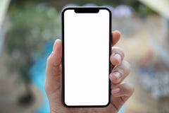 Man hand holding phone with isolated screen background pool Stock Photography Man hand holding phone with isolated screen background pool Stock Photography
