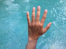 A man is hand holds up for help. stock images A man is hand holds up for help. stock images