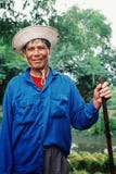 man harvesting and cleaning rice next to a river in the rural part of the country royalty free stock photo man harvesting and cleaning rice next to a river in the rural part of the country royalty free stock photo