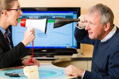 Man at hearing acoustician should take test royalty free stock photos Man at hearing acoustician should take test royalty free stock photos