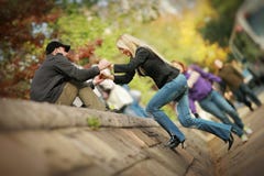 Man helping woman Stock Images Man helping woman Stock Images