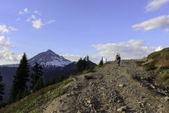 Man hiking to top of the mountain wallpaper royalty free stock image Man hiking to top of the mountain wallpaper royalty free stock image