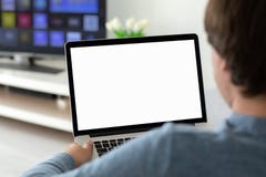 Man holding laptop with screen in the room royalty free stock photography Man holding laptop with screen in the room royalty free stock photography
