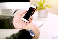 Man holding phone in hand. Royalty Free Stock Photo Man holding phone in hand. Royalty Free Stock Photo