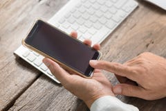 Man holding and using smart phone . royalty free stock image Man holding and using smart phone . royalty free stock image