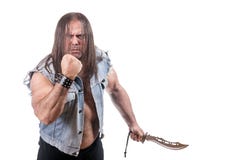 Man in jeans jacket threaten with fist and knife royalty free stock photography Man in jeans jacket threaten with fist and knife royalty free stock photography