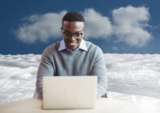 Man on laptop in sea of documents under sky clouds. Digital composite of man on laptop in sea of documents under sky clouds Stock Photos Man on laptop in sea of documents under sky clouds. Digital composite of man on laptop in sea of documents under sky clouds Stock Photos
