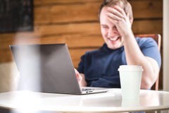 Man Laughing While Using Laptop. Happy Smiling Guy With Computer Stock Image - Image of lifestyle, happy: 118616927
